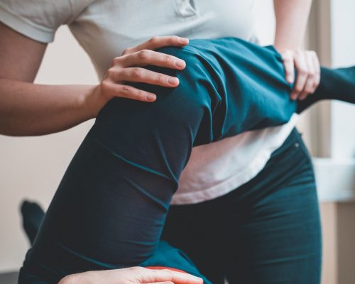 A vertical closeup of massage and stretching